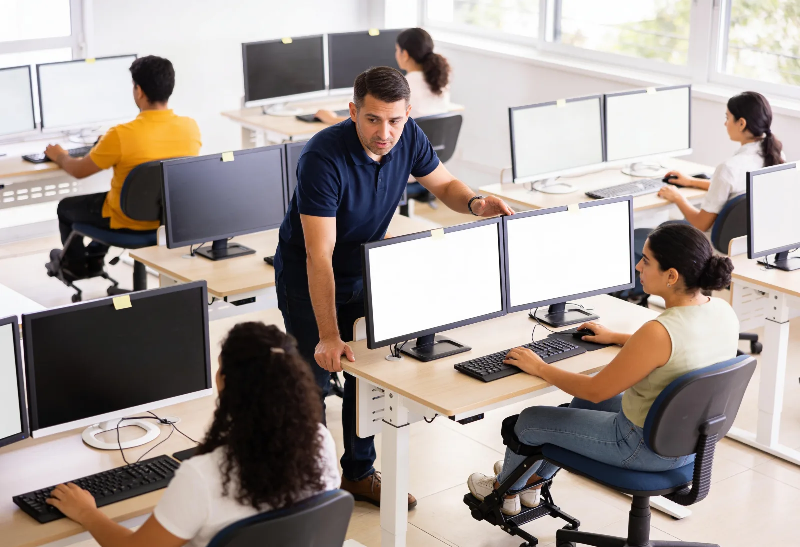 Employees at their desks during a break led by THA