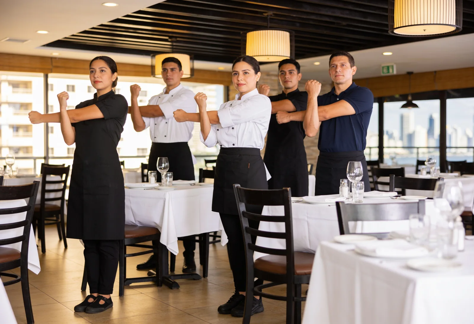 Restaurant team following a THA instructor
