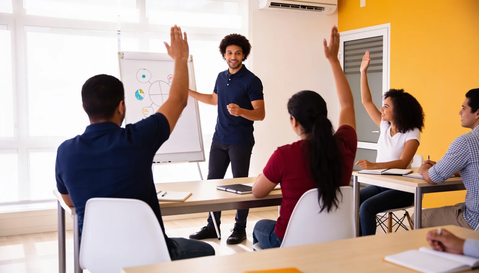 Employees practicing posture adjustments in an ergonomics workshop